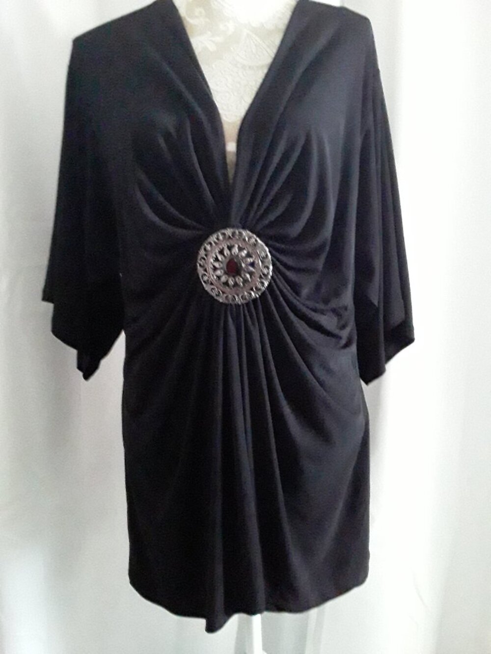 Torrid lovely buckle neckline batwing top size 3